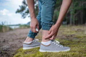 Man with gnat bit on ankle